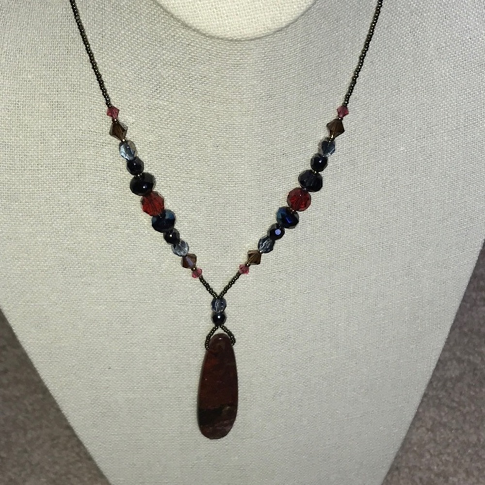 Glass pendant beaded